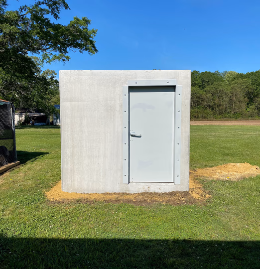 Above ground concrete tornado shelter installation